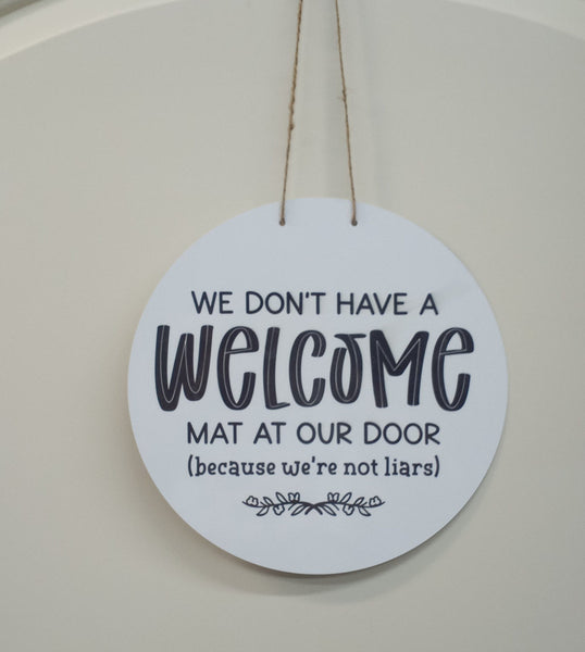 We Don't Have a Welcome Mat At Our Door (because we're not liars) Door Sign